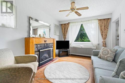 42 Thirty Eighth Street, Toronto, ON - Indoor Photo Showing Living Room With Fireplace