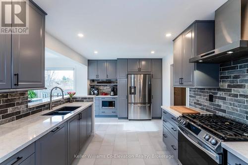 2145 Hughes Drive, Innisfil, ON - Indoor Photo Showing Kitchen With Stainless Steel Kitchen With Double Sink With Upgraded Kitchen