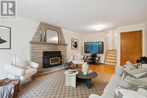 706 Tulip Court, Oshawa, ON - Indoor Photo Showing Living Room With Fireplace