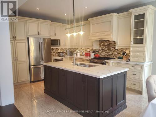 11 Rivoli Drive, Vaughan, ON - Indoor Photo Showing Kitchen With Double Sink With Upgraded Kitchen