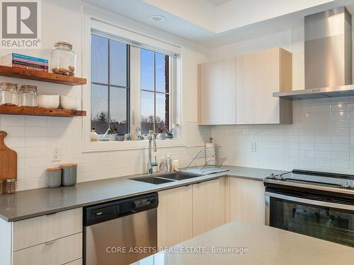 304 - 199 Pine Grove Road, Vaughan, ON - Indoor Photo Showing Kitchen With Double Sink