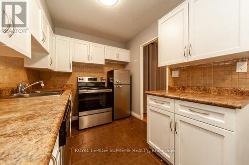 105 - 270 Scarlett Road, Toronto, ON - Indoor Photo Showing Kitchen With Double Sink