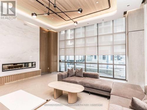 1004 - 65 Annie Craig Road, Toronto, ON - Indoor Photo Showing Living Room With Fireplace