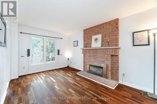 140 Lord Simcoe Drive W, Brampton, ON - Indoor Photo Showing Living Room With Fireplace