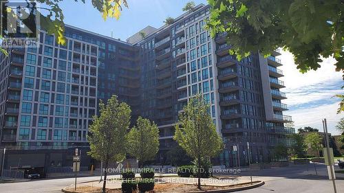 410 - 80 Esther Lorrie Drive, Toronto, ON - Outdoor With Balcony With Facade