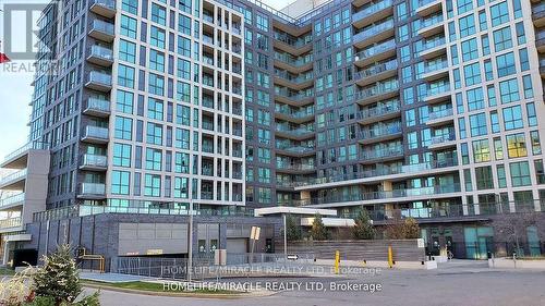 410 - 80 Esther Lorrie Drive, Toronto, ON - Outdoor With Balcony With Facade