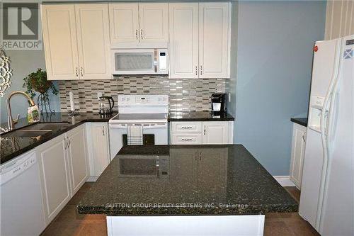 325 Hobbs Crescent, Milton, ON - Indoor Photo Showing Kitchen With Double Sink