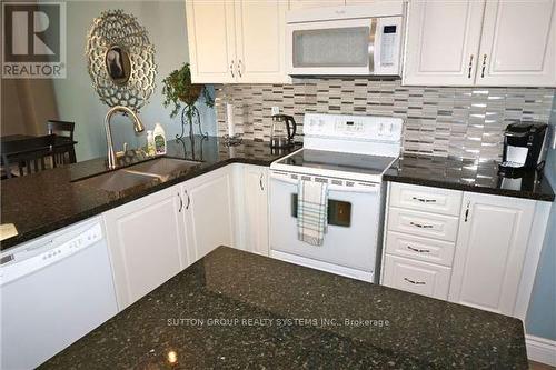 325 Hobbs Crescent, Milton, ON - Indoor Photo Showing Kitchen With Double Sink