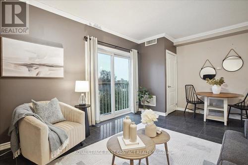 410 - 112 Simcoe Road, Bradford West Gwillimbury, ON - Indoor Photo Showing Living Room