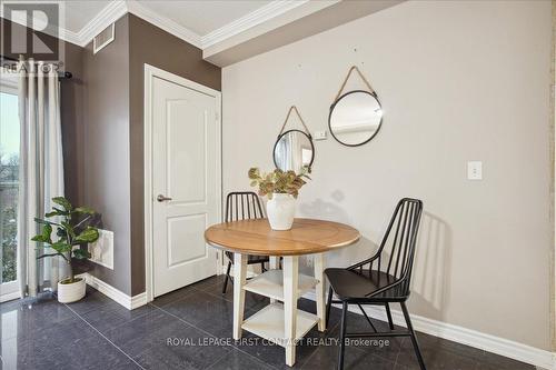 410 - 112 Simcoe Road, Bradford West Gwillimbury, ON - Indoor Photo Showing Dining Room