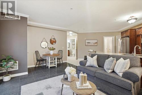 410 - 112 Simcoe Road, Bradford West Gwillimbury, ON - Indoor Photo Showing Living Room