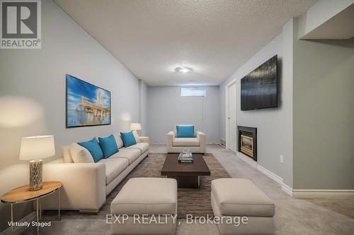 2 - 125 Sekura Crescent, Cambridge, ON - Indoor Photo Showing Living Room With Fireplace