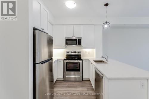 110 - 50 Lakebreze Drive, Clarington, ON - Indoor Photo Showing Kitchen With Double Sink With Upgraded Kitchen