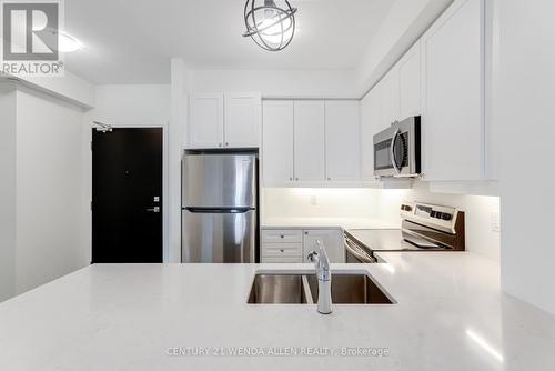 110 - 50 Lakebreze Drive, Clarington, ON - Indoor Photo Showing Kitchen With Double Sink With Upgraded Kitchen