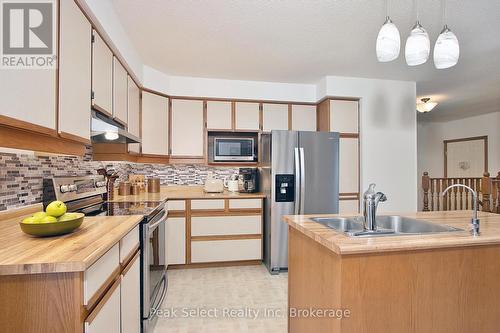 68 Devon Drive, South Huron (Exeter), ON - Indoor Photo Showing Kitchen With Double Sink