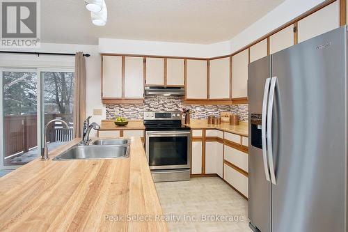 68 Devon Drive, South Huron (Exeter), ON - Indoor Photo Showing Kitchen With Double Sink