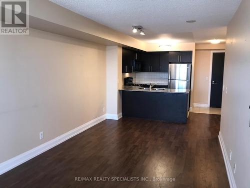 412 - 55 De Boers Drive, Toronto, ON - Indoor Photo Showing Kitchen With Double Sink