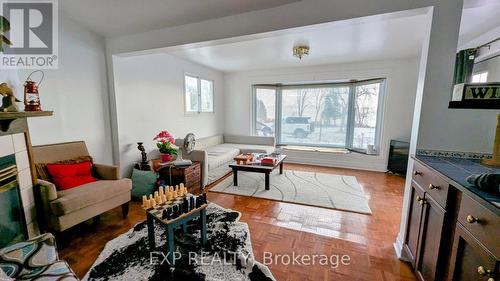 556 Northshore Road W, Otonabee-South Monaghan, ON - Indoor Photo Showing Living Room With Fireplace