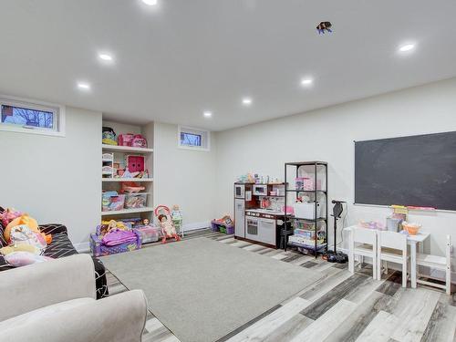 Playroom - 146 Boul. Ste-Rose E., Laval (Auteuil), QC - Indoor Photo Showing Basement