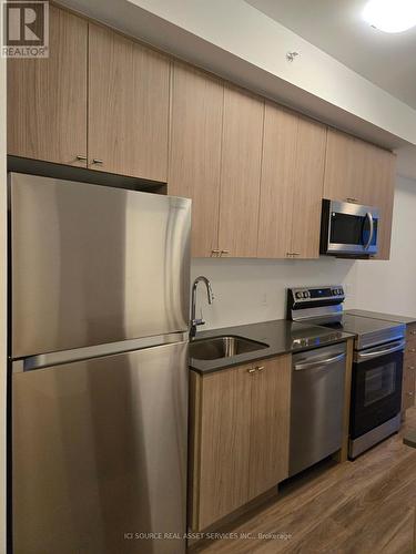 209 - 480 Gordon Krantz Avenue, Milton, ON - Indoor Photo Showing Kitchen With Stainless Steel Kitchen