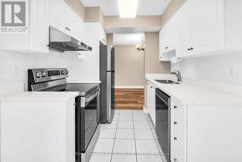 605 - 43 Eglinton Avenue E, Toronto, ON - Indoor Photo Showing Kitchen With Double Sink