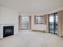 404-1560 Hillside Ave, Victoria, BC  - Indoor Photo Showing Living Room With Fireplace 