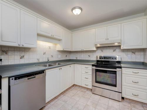 404-1560 Hillside Ave, Victoria, BC - Indoor Photo Showing Kitchen With Double Sink