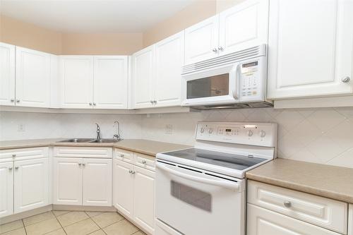 403-303 Whitman Road, Kelowna, BC - Indoor Photo Showing Kitchen With Double Sink