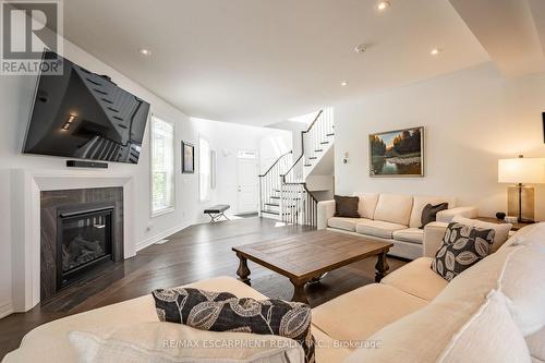 27 Willow Bank Common, St. Catharines, ON - Indoor Photo Showing Living Room With Fireplace