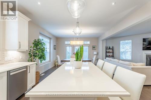 27 Willow Bank Common, St. Catharines, ON - Indoor Photo Showing Dining Room With Fireplace