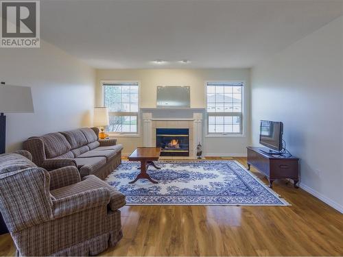 3333 South Main Street Unit# 138, Penticton, BC - Indoor Photo Showing Living Room With Fireplace