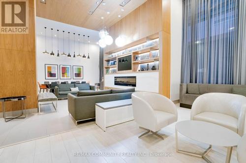 824 - 295 Adelaide Street W, Toronto, ON - Indoor Photo Showing Living Room With Fireplace