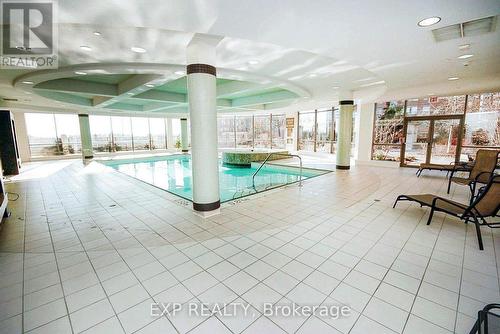 121 - 3888 Duke Of York Boulevard, Mississauga, ON - Indoor Photo Showing Other Room With In Ground Pool