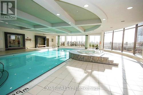 121 - 3888 Duke Of York Boulevard, Mississauga, ON - Indoor Photo Showing Other Room With In Ground Pool