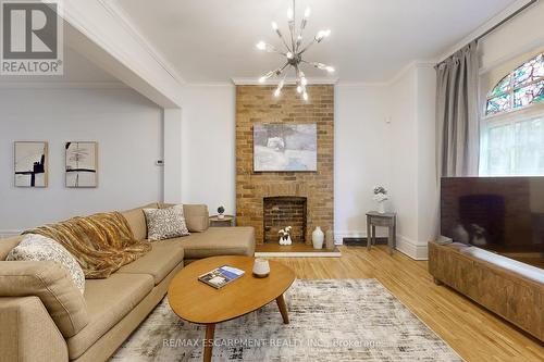 18 Spring Street, Hamilton, ON - Indoor Photo Showing Living Room With Fireplace