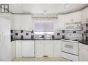 32 3889 Muller Avenue, Terrace, BC  - Indoor Photo Showing Kitchen With Double Sink 