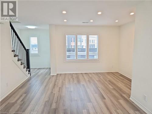 Unfurnished living room with light wood-type flooring - 235 Chapel Hill Dr Drive Unit# 16, Kitchener, ON - Indoor Photo Showing Other Room