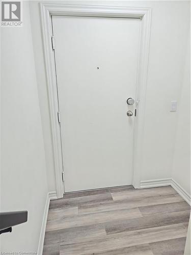 Doorway to outside featuring light hardwood / wood-style flooring - 235 Chapel Hill Dr Drive Unit# 16, Kitchener, ON - Indoor Photo Showing Other Room