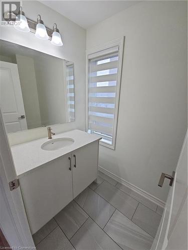 Bathroom with tile patterned flooring and vanity - 235 Chapel Hill Dr Drive Unit# 16, Kitchener, ON - Indoor Photo Showing Bathroom