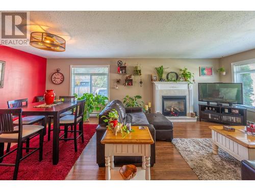 1120 8Th  S Street, Golden, BC - Indoor Photo Showing Living Room With Fireplace