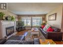 1120 8Th  S Street, Golden, BC  - Indoor Photo Showing Living Room With Fireplace 