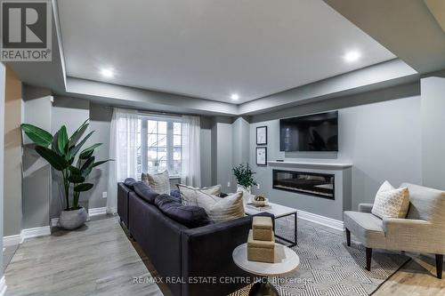 25 Jeffrey Drive, Guelph (Grange Hill East), ON - Indoor Photo Showing Living Room With Fireplace