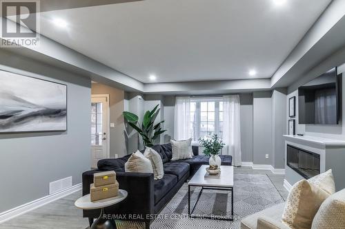 25 Jeffrey Drive, Guelph (Grange Hill East), ON - Indoor Photo Showing Living Room With Fireplace