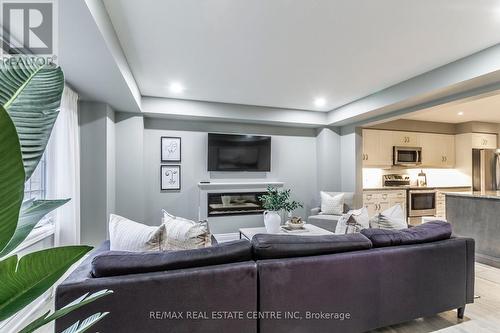 25 Jeffrey Drive, Guelph (Grange Hill East), ON - Indoor Photo Showing Living Room With Fireplace