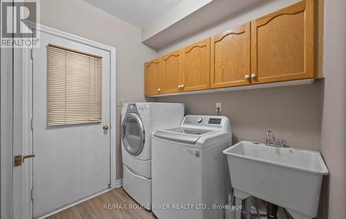 30 Ravenview Drive, Whitby, ON - Indoor Photo Showing Laundry Room