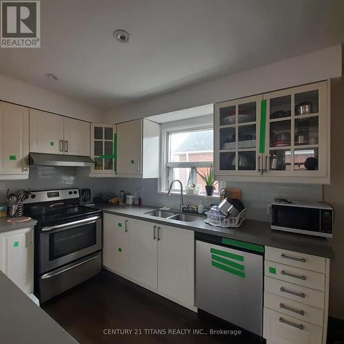 670 Pharmacy Main Avenue, Toronto, ON - Indoor Photo Showing Kitchen With Double Sink