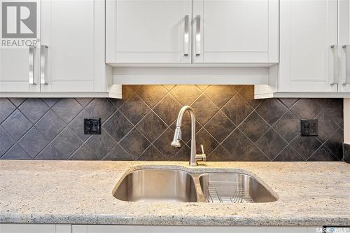 301 2305 Adelaide Street, Saskatoon, SK - Indoor Photo Showing Kitchen With Double Sink