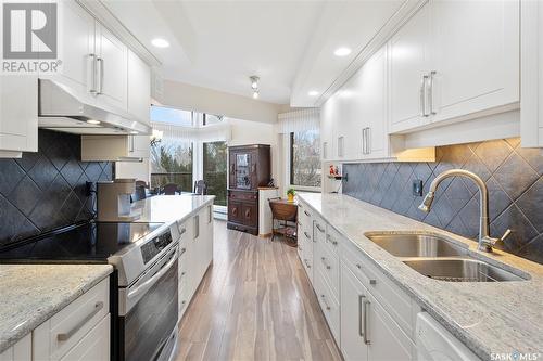 301 2305 Adelaide Street, Saskatoon, SK - Indoor Photo Showing Kitchen With Double Sink With Upgraded Kitchen