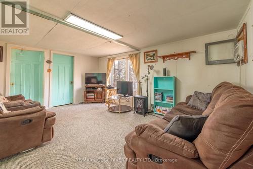 2 - 7214 County Rd 18 Road, Alnwick/Haldimand, ON - Indoor Photo Showing Living Room With Fireplace