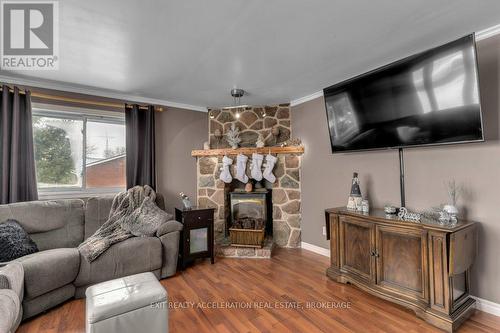 656 County 8 Road, Greater Napanee, ON - Indoor Photo Showing Living Room With Fireplace